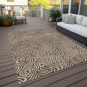 Photo of Brown And Beige Abstract Washable Indoor Outdoor Area Rug