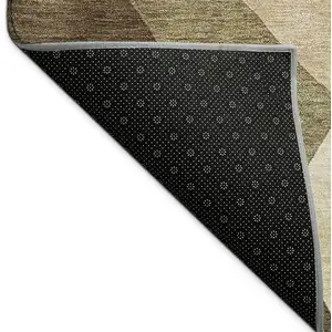 Photo of Brown And Beige Abstract Washable Indoor Outdoor Area Rug