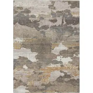 Photo of Brown And Beige Abstract Washable Indoor Outdoor Area Rug