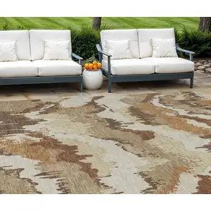 Photo of Brown And Beige Abstract Washable Indoor Outdoor Area Rug