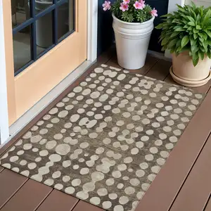 Photo of Brown And Beige Abstract Washable Indoor Outdoor Area Rug