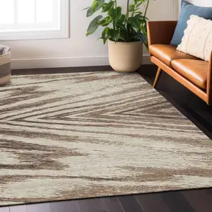 Photo of Brown And Beige Abstract Washable Indoor Outdoor Area Rug