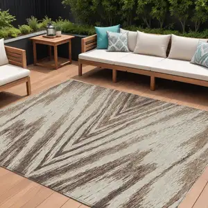 Photo of Brown And Beige Abstract Washable Indoor Outdoor Area Rug