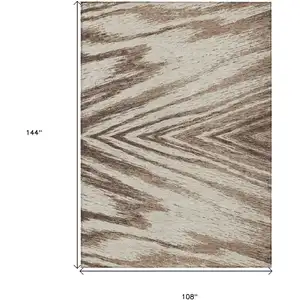 Photo of Brown And Beige Abstract Washable Indoor Outdoor Area Rug
