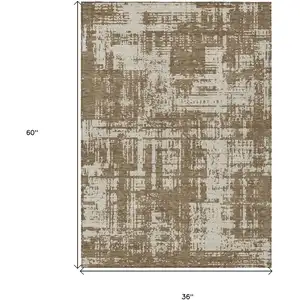 Photo of Brown And Beige Abstract Washable Indoor Outdoor Area Rug