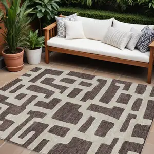 Photo of Brown And Beige Abstract Washable Indoor Outdoor Area Rug