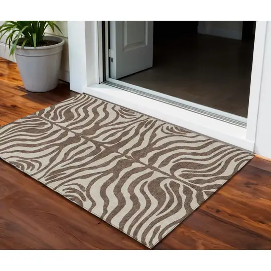 Brown And Beige Animal Print Washable Indoor Outdoor Area Rug Photo 1