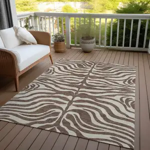 Photo of Brown And Beige Animal Print Washable Indoor Outdoor Area Rug