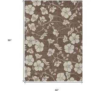 Photo of Brown And Beige Floral Washable Indoor Outdoor Area Rug