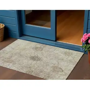 Photo of Brown And Beige Floral Washable Indoor Outdoor Area Rug