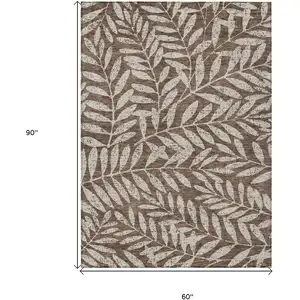 Photo of Brown And Beige Floral Washable Indoor Outdoor Area Rug