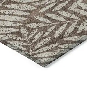 Photo of Brown And Beige Floral Washable Indoor Outdoor Area Rug