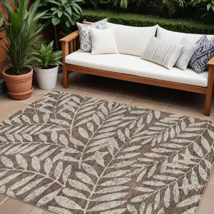 Photo of Brown And Beige Floral Washable Indoor Outdoor Area Rug