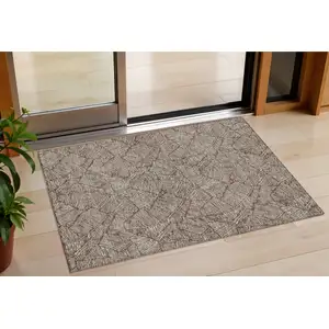 Photo of Brown And Beige Floral Washable Indoor Outdoor Area Rug