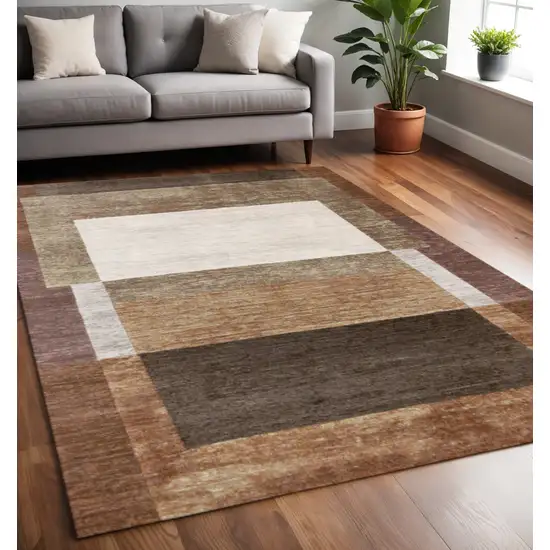 Brown And Beige Geometric Area Rug Photo 1