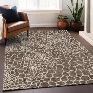 Photo of Brown And Beige Geometric Washable Area Rug With UV Protection