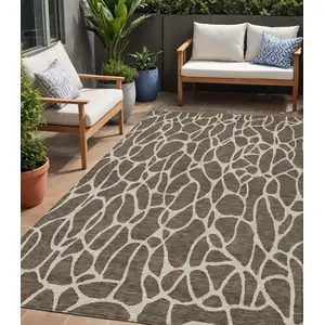 Photo of Brown And Beige Geometric Washable Indoor Outdoor Area Rug