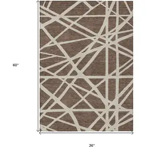 Photo of Brown And Beige Geometric Washable Indoor Outdoor Area Rug