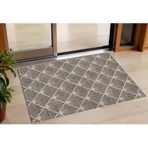 Photo of Brown And Beige Geometric Washable Indoor Outdoor Area Rug