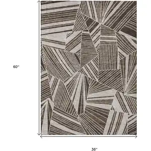 Photo of Brown And Beige Geometric Washable Indoor Outdoor Area Rug