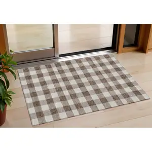 Photo of Brown And Beige Plaid Washable Indoor Outdoor Area Rug