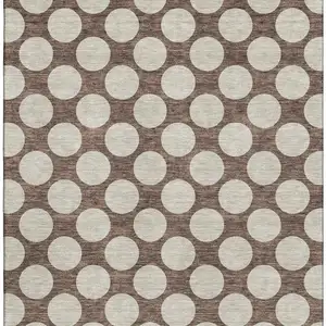 Photo of Brown And Beige Polka Dot Washable Area Rug With UV Protection