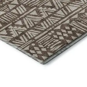 Photo of Brown And Beige Southwestern Washable Area Rug With UV Protection