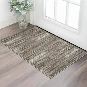 Photo of Brown And Beige Striped Washable Area Rug With UV Protection