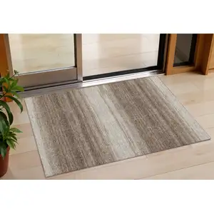 Photo of Brown And Beige Striped Washable Indoor Outdoor Area Rug