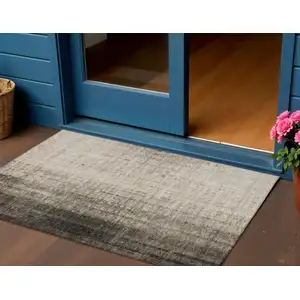 Photo of Brown And Beige Striped Washable Indoor Outdoor Area Rug