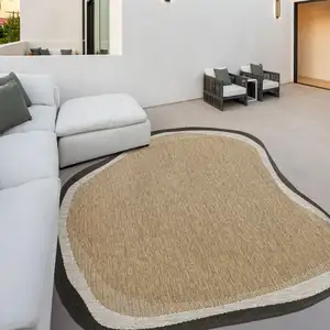 Photo of Brown And Black Abstract Indoor Outdoor Area Rug