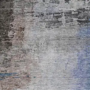 Photo of Brown And Blue Abstract Washable Area Rug With UV Protection