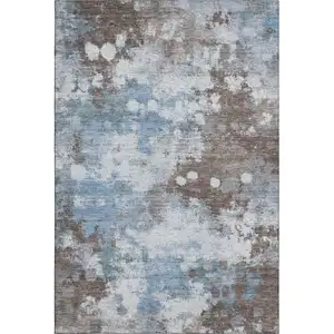 Photo of Brown And Blue Abstract Washable Area Rug With UV Protection