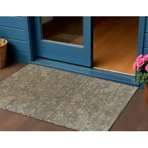 Photo of Brown And Blue Medallion Washable Indoor Outdoor Area Rug