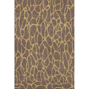 Photo of Brown And Gold Geometric Washable Area Rug With UV Protection