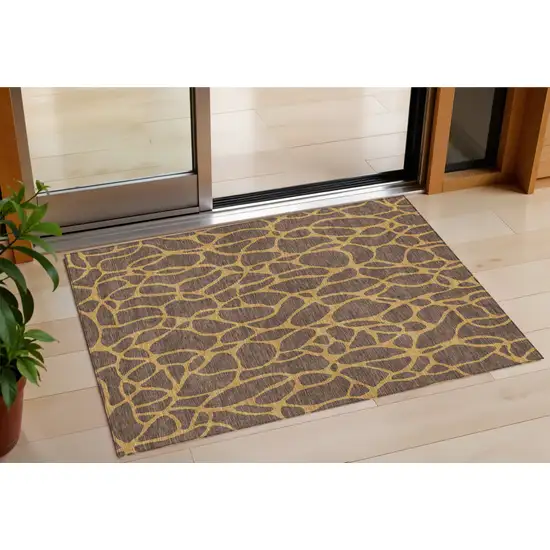 Brown And Gold Geometric Washable Indoor Outdoor Area Rug Photo 1
