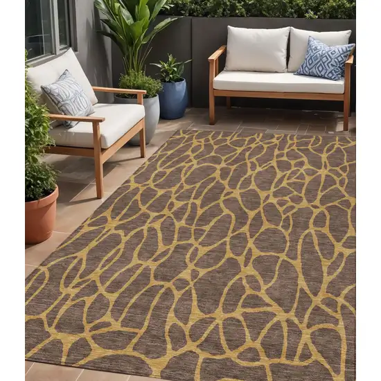 Brown And Gold Geometric Washable Indoor Outdoor Area Rug Photo 1