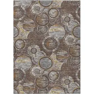 Photo of Brown And Gold Geometric Washable Indoor Outdoor Area Rug