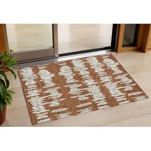 Photo of Brown And Gray Striped Washable Indoor Outdoor Area Rug
