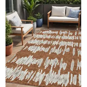 Photo of Brown And Gray Striped Washable Indoor Outdoor Area Rug
