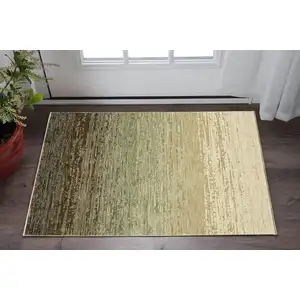 Photo of Brown And Green Abstract Area Rug