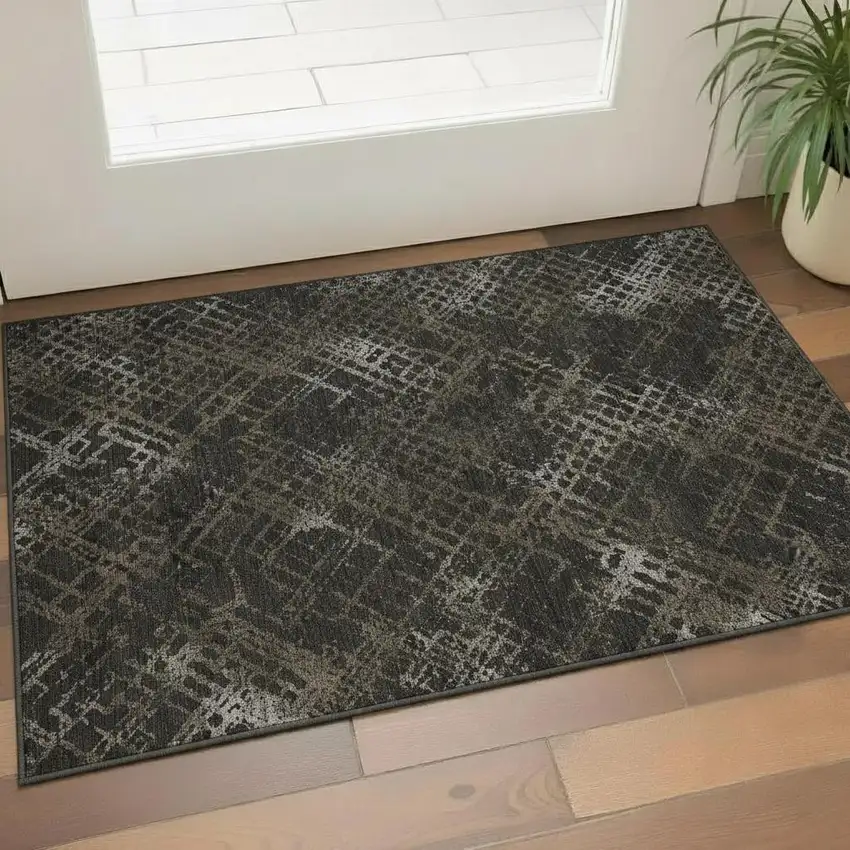 Brown And Ivory Abstract Geometric Washable Area Rug With UV Protection Photo 1