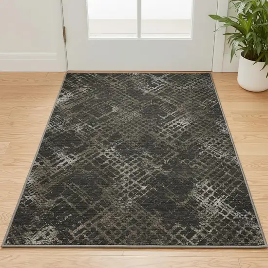 Brown And Ivory Abstract Geometric Washable Area Rug With UV Protection Photo 2