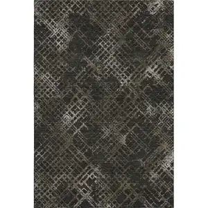 Photo of Brown And Ivory Abstract Geometric Washable Area Rug With UV Protection