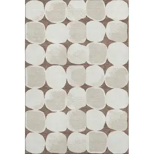 Photo of Brown And Ivory Abstract Geometric Washable Area Rug With UV Protection