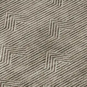 Photo of Brown And Ivory Abstract Geometric Washable Area Rug With UV Protection