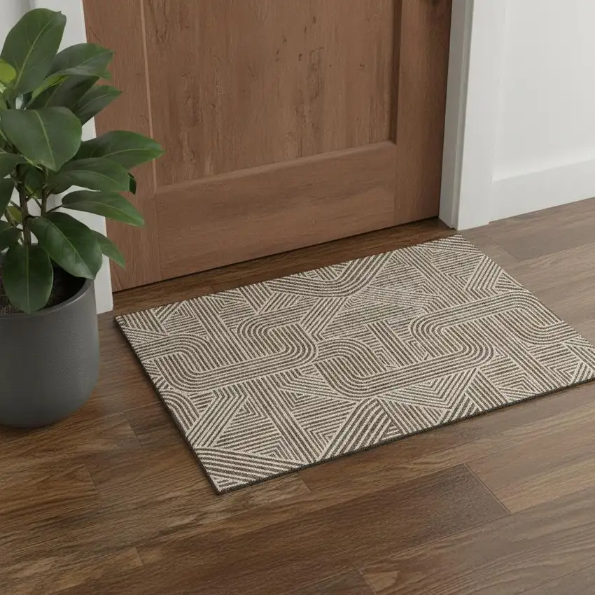 Brown And Ivory Abstract Geometric Washable Area Rug With UV Protection Photo 1