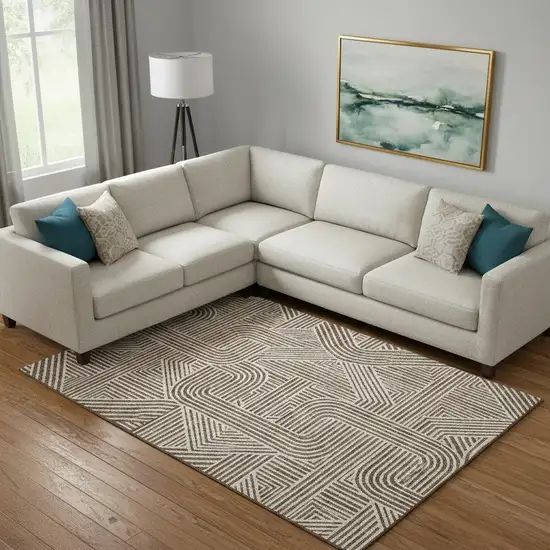 Brown And Ivory Abstract Geometric Washable Area Rug With UV Protection Photo 1