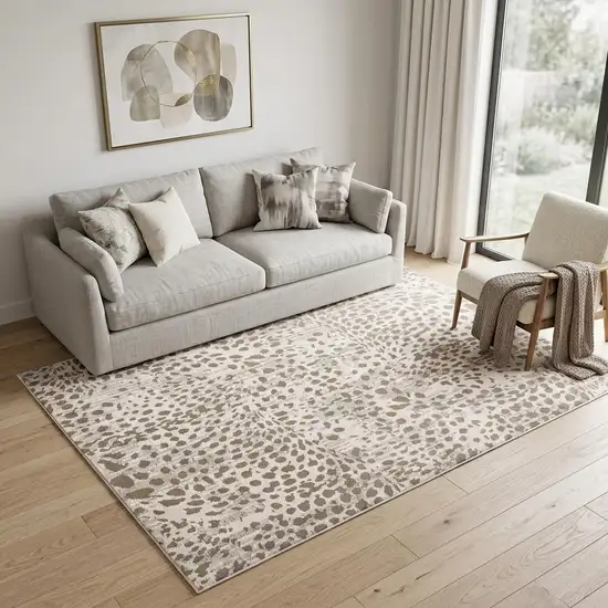 Brown And Ivory Abstract Stain Resistant Area Rug Photo 1