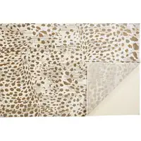 Photo of Brown And Ivory Abstract Stain Resistant Area Rug